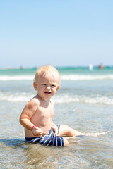 happy child playing on beach
