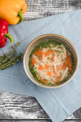 chicken soup, chicken soup on a white wooden background, top view © РоманЪ