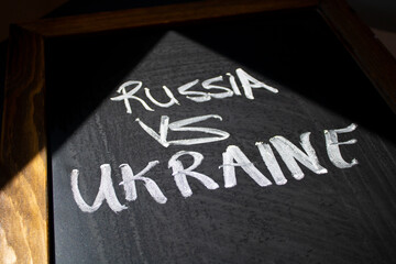 Fototapeta premium Russia vs. Ukraine is on a chalkboard