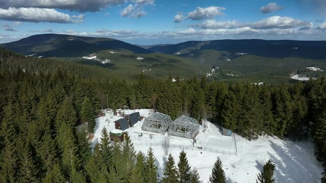 Science station greenhouse snow winter frost drone aerial open top chambers climate change research Bily Kriz, plant spruce Picea abies Norway European mountain beech Fagus sylvatica common scientific