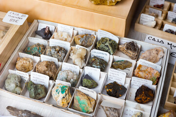 Variety of mineral speciments on counter in souvenir shop with descriptions in Spanish language on...