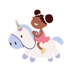girl playing with unicorn