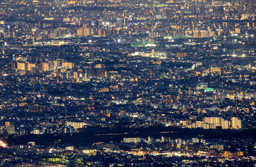 Lights from buildings in sprawling city at night
