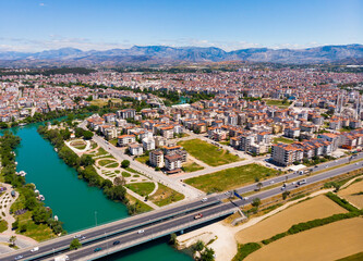 Fototapeta premium Aerial view of Manavgat city with view of Manavgat River, Antalya Province, Turkey.
