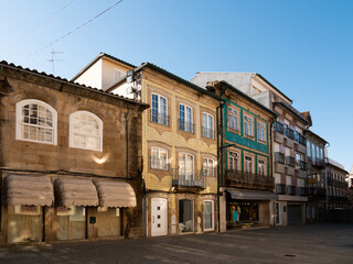 Fototapeta na wymiar Picturesque view of old houses and streets of Vila Real town at sunny spring morning, Portugal