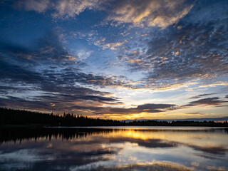 Colorful sunrise over an alpine lake