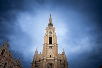 Fototapeta na wymiar The Name of Mary Church, also known as Novi Sad catholic cathedral or crkva imena marijinog during a cloudy afternoon. This cathedral is one of the most important landmarks of Novi Sad, Serbia.....