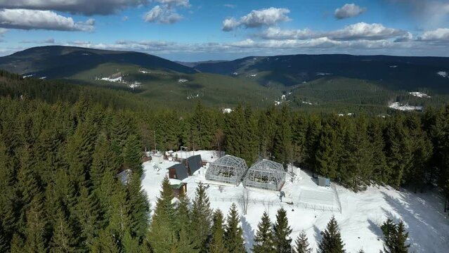 Station science greenhouse snow winter frost drone aerial open top chambers climate change research Bily Kriz, plant spruce Picea abies Norway European mountain beech Fagus sylvatica common scientific