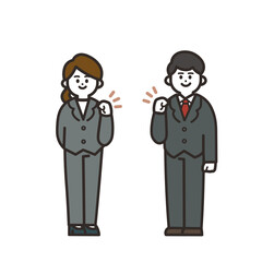 控えめにガッツポーズをするスーツの男女