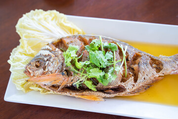 deep fried fish serve with fish sauce