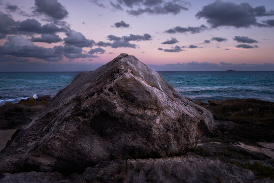 rocks in the sea at sunset