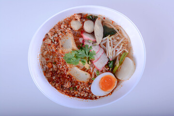 Thai noodle soup,Tom Yum , Thai Food  in White Bowl and isolate background with clipping path