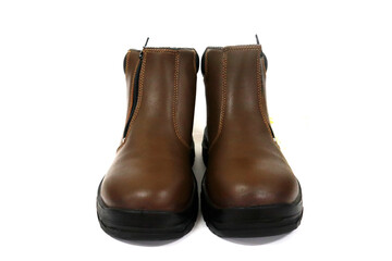 Black safety shoes to protect the feet of the workers from the impact of hard objects