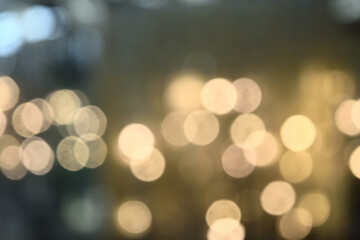 Bokeh from indoor lighting,  Colorful light circles spread on blue with yellow and green background...