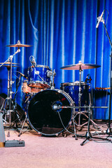 Fototapeta na wymiar Variety drum set on the scene of a night club