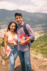 College student couple with the city of Jinotega, Nicaragua in the background