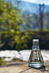 Glass flask with clean drinking water.