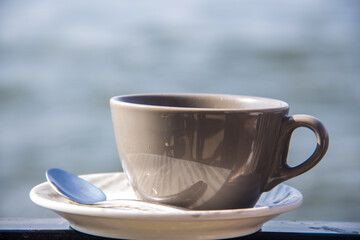 Cup of Coffee Nile view, shot is selective focus with shallow depth of field. Photos taken at Cairo Egypt