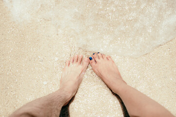 feet on the beach