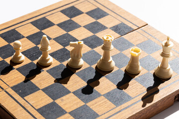 Chess pieces on a chess board
