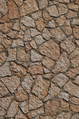 Facades marble stone wall. Pieces of pink marble on the wall. Texture stone on the facade of the house. Pattern of decorative marble stone wall surface.