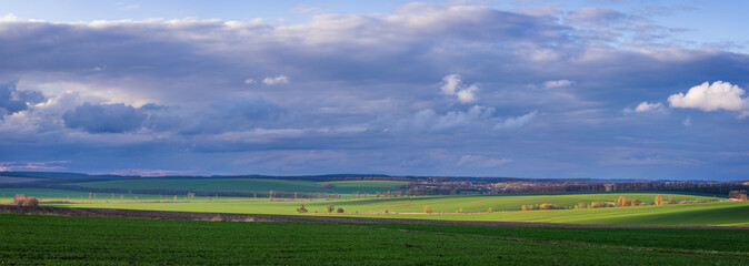 Clouds moving  across the sky over rural fields in Ukraine