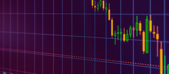 Daily trading prices on the online stock market graph showing on purple screen.Daily investor's business everyday life.Banner,selective focus.