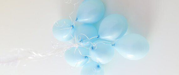 Banner.Bunch of blue balloons on white background. Greeting card,selective focus.