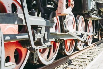 Old historic steam locomotive wheels part shot close up.Selective focus.