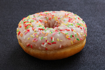 Sweet glazed vanilla donut with icing