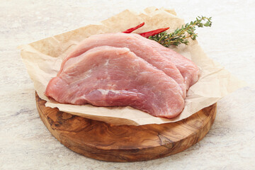 Raw pork schnitzel for roast