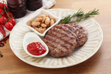 Grilled beef burger cutlet with sauce