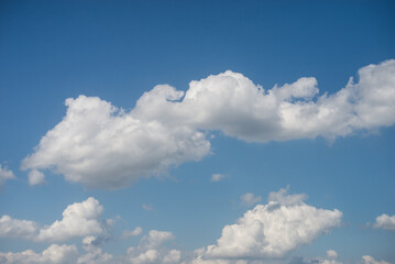 Naklejka na ściany i meble Closeup of beautiful clouds on blue sky background
