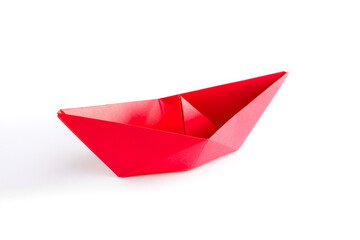 Red paper boat origami isolated on a white background