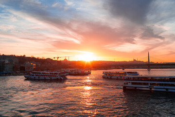 Fototapeta na wymiar Boats in sea and scenic sunset in Istanbul