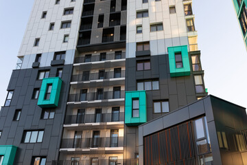 residential apartment building close-up against the blue sky