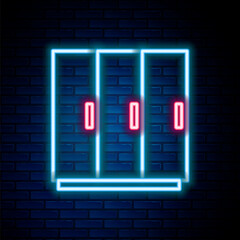 Glowing neon line Wardrobe icon isolated on brick wall background. Colorful outline concept. Vector