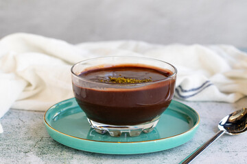 Supangle dessert or sup dessert on stone background. Chocolate pudding with cream filling in the middle. World cuisine delicacies. close up