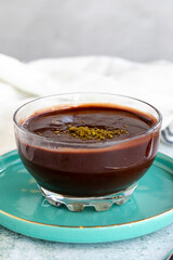 Supangle dessert or sup dessert on stone background. Chocolate pudding with cream filling in the middle. World cuisine delicacies. close up