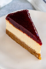 Raspberry Cheesecake. Cheesecake dessert on a white background. World cuisine delicacies. close up