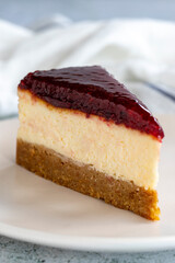 Raspberry Cheesecake. Cheesecake dessert on a white background. World cuisine delicacies. close up