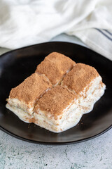 Cold baklava. Baklava with milk on a white background. Turkish cuisine delicacies. close up