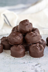 Hazelnut chocolate. Special hazelnut chocolate on a white background. close up
