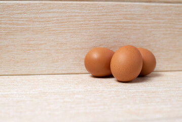 eggs on wooden table, eggs on wooden table and copy space