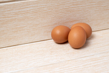 eggs on wooden table, eggs on wooden table and copy space