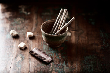 Traditional, handcrafted ceramic. Rustic wooden background. Close up. Copy space.