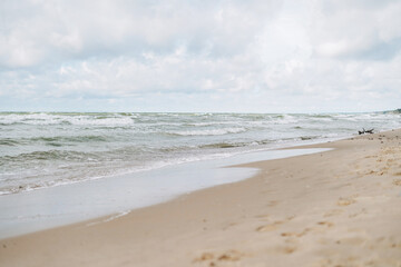 Fototapeta na wymiar Sand beach on Baltic sea in a storm