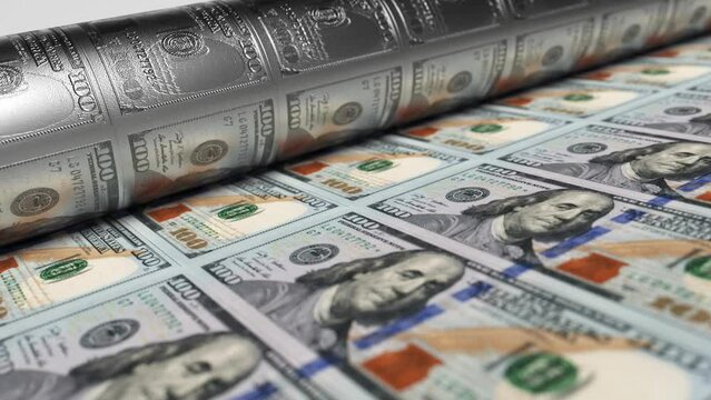 100 USA dollars banknotes are being printed by currency press machine. Close up background showing a process of american bills printing. Seamless loop video of money printing process.