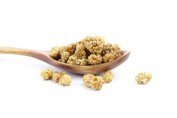 Mulberry dry berries morus alba in wooden spoon isolated on white