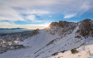 Vivid sunrise in the mountains. A red morning in the Julian Alps.